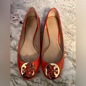 Tory Burch that’s in pumpkin orange